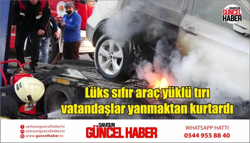 Lüks sıfır araç yüklü tırı vatandaşlar yanmaktan kurtardı