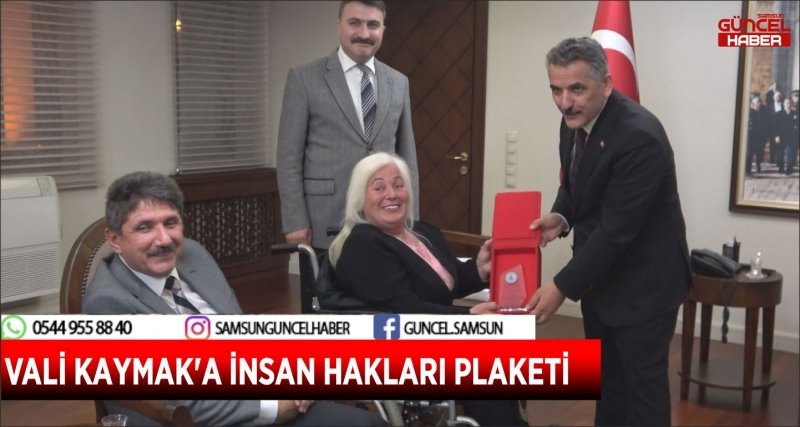 VALİ KAYMAK'A İNSAN HAKLARI PLAKETİ 